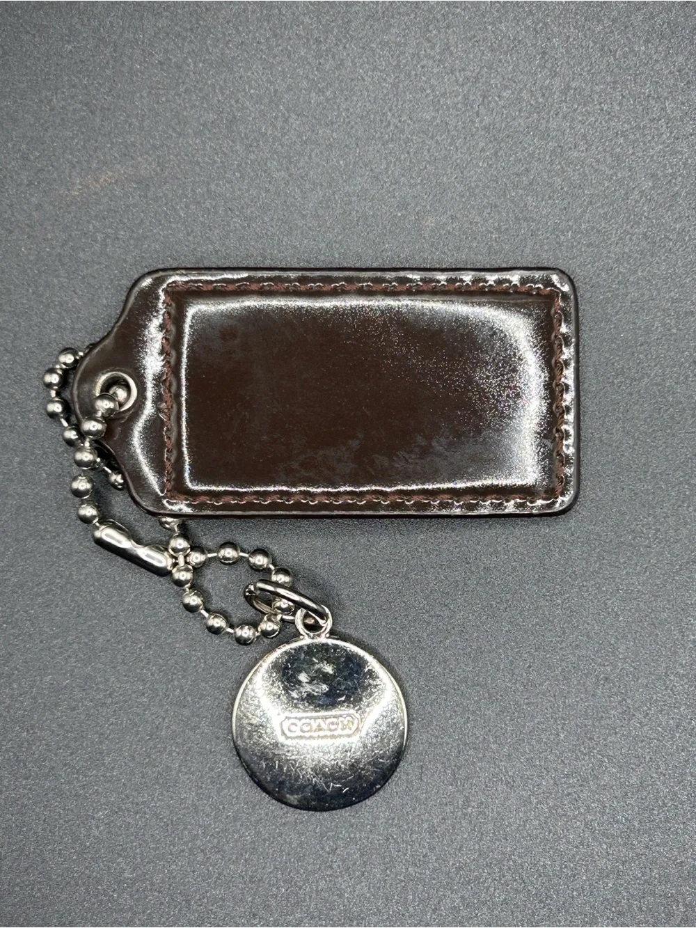 Coach Dark Brown Leather Key Tag with Silver-Tone Chain and Charm